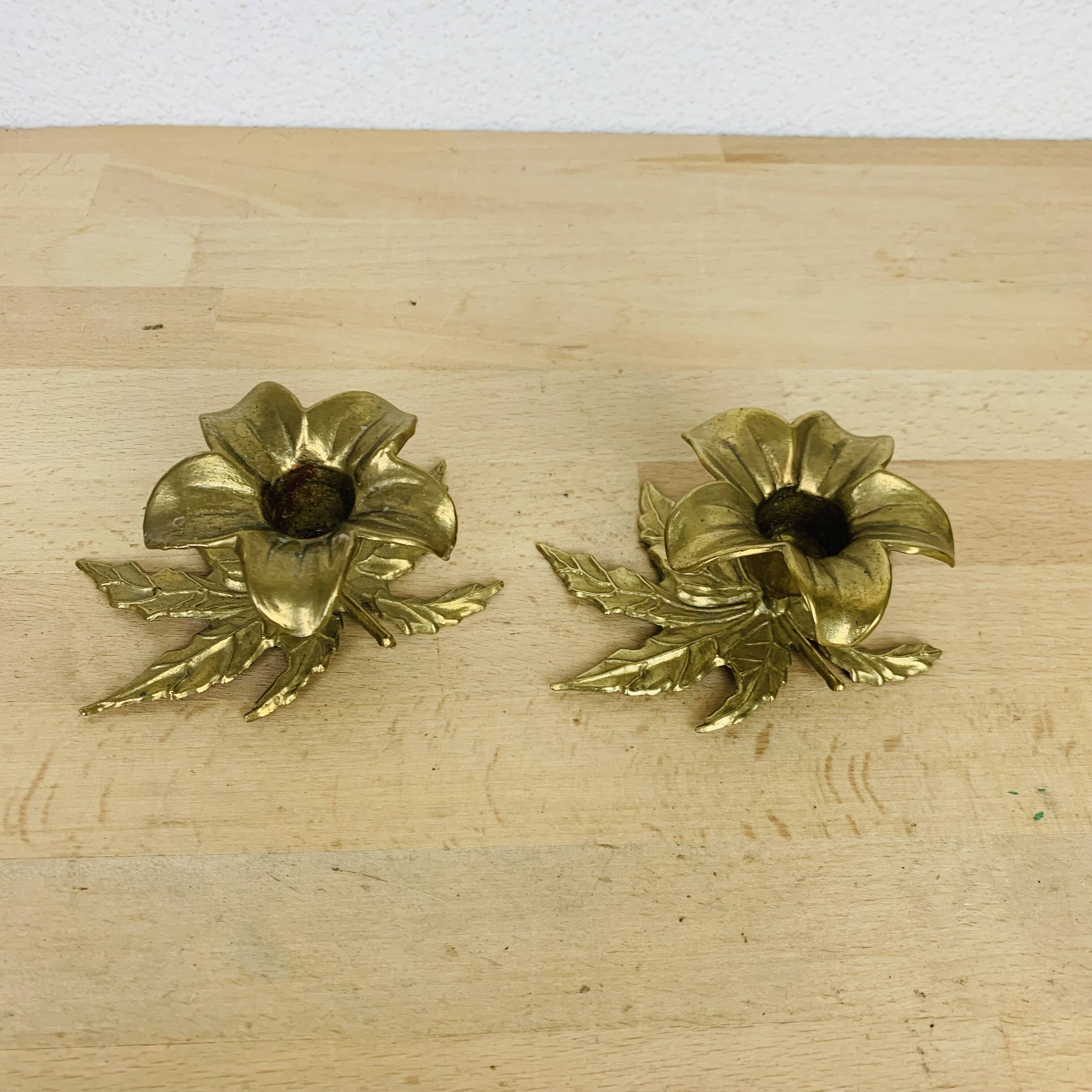 Pair of gilded brass flower candlesticks