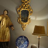Carved and gilded wooden mirror with gold leaf 46 x 103 cm