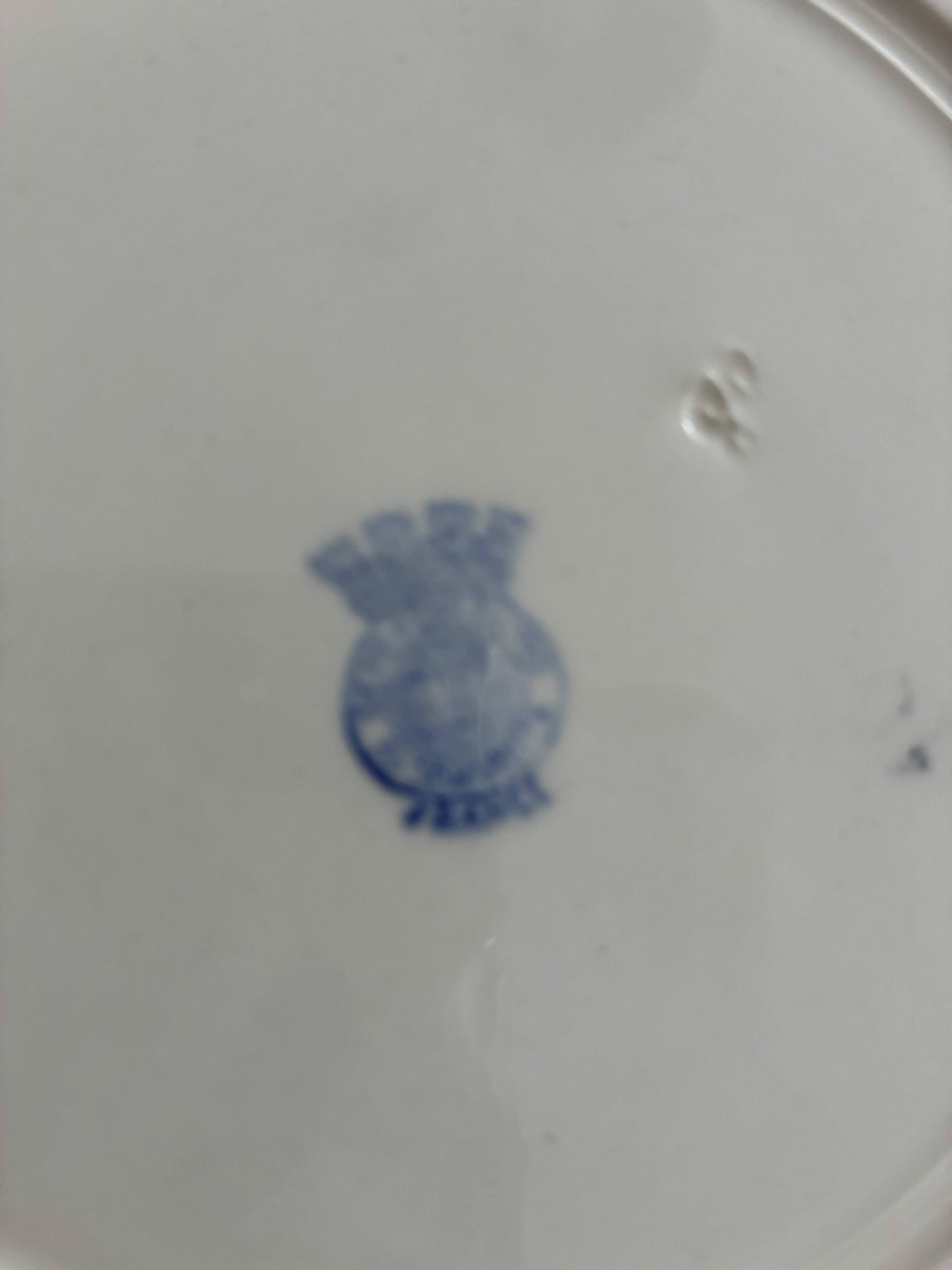 Set of 6 vintage dessert plates with blue patterns.