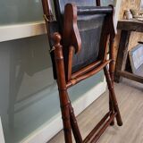 Colonial style folding leather and teak armchair