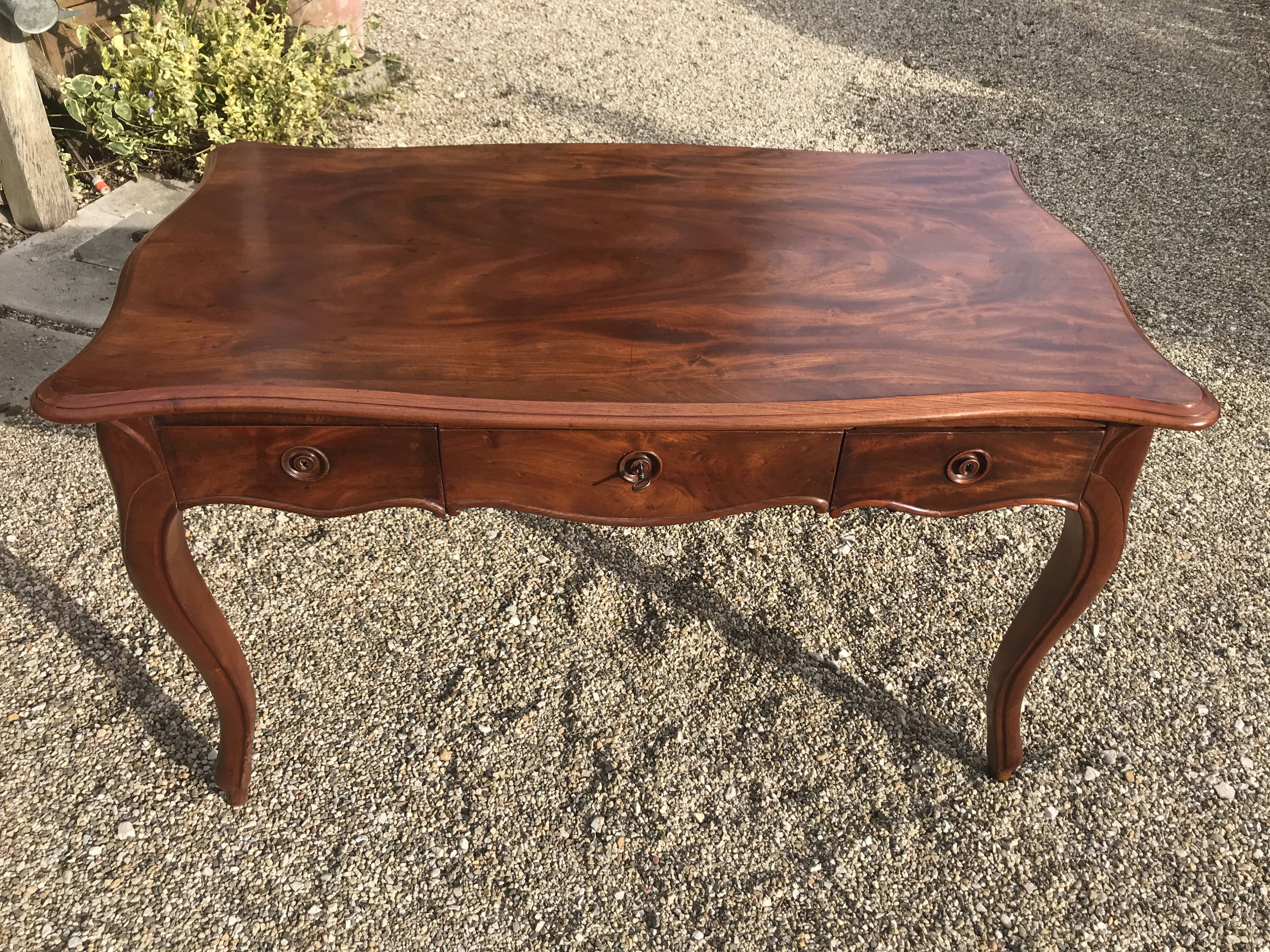 Louis XV-style mahogany desk