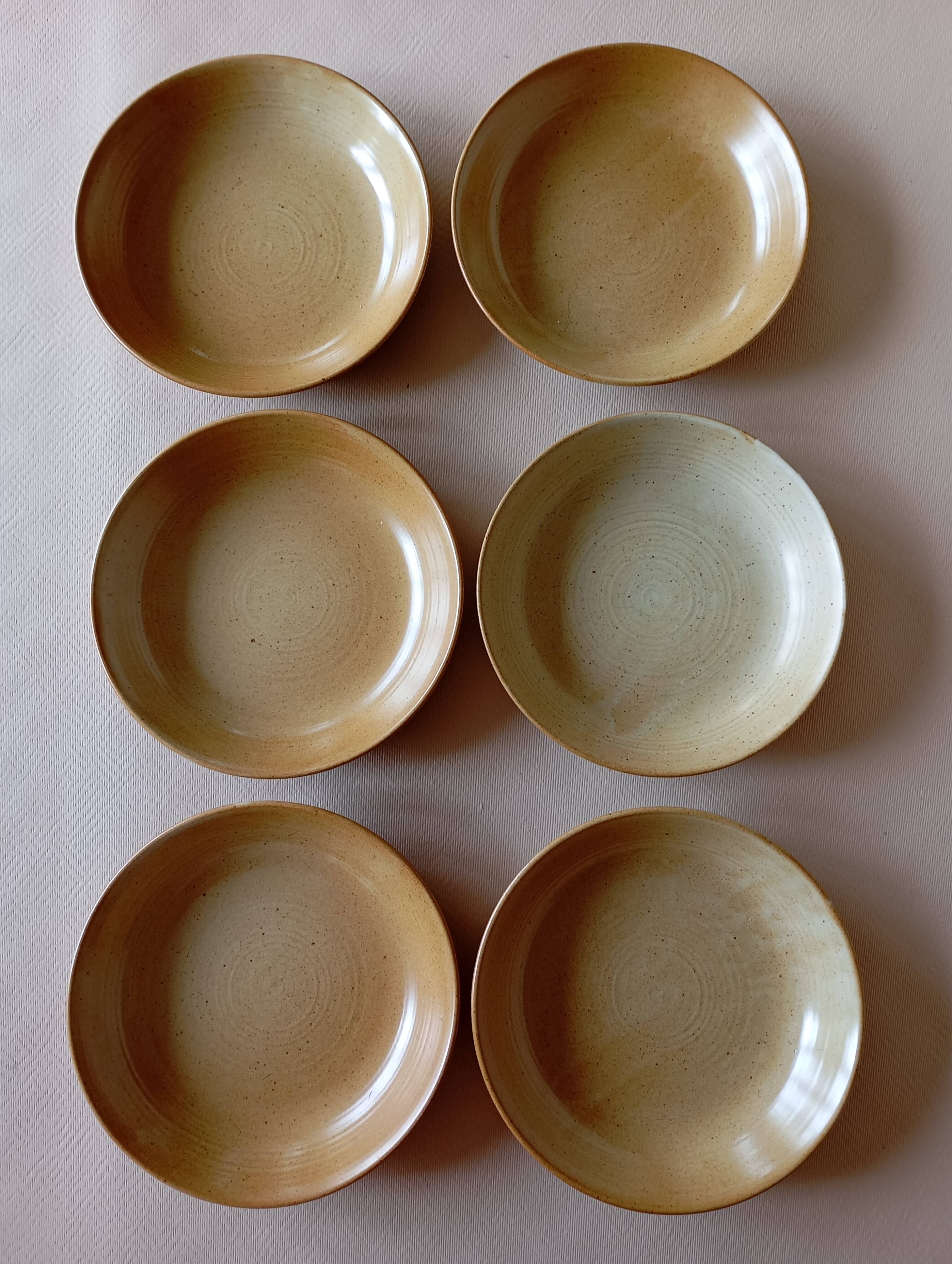 6 CNP Village stoneware skullcap plates