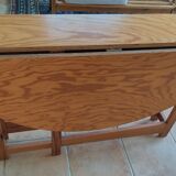 Foldable oval half-moon table, sliding legs