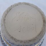 Signed sandstone pot cover