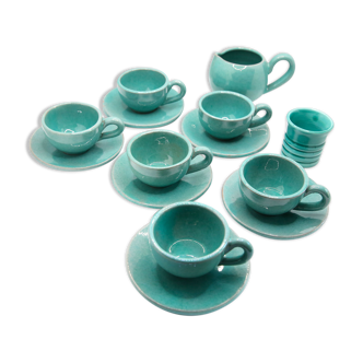 Set of 6 cups in turquoise blue enamelled earth with their saucers and milk jar