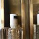 Pair of Vitrika wall lamps in glass and brass