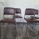 Lot de 4 chaises fauteuil en skaï marron année 1970