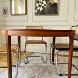 Round extendable rosewood table from the 70s