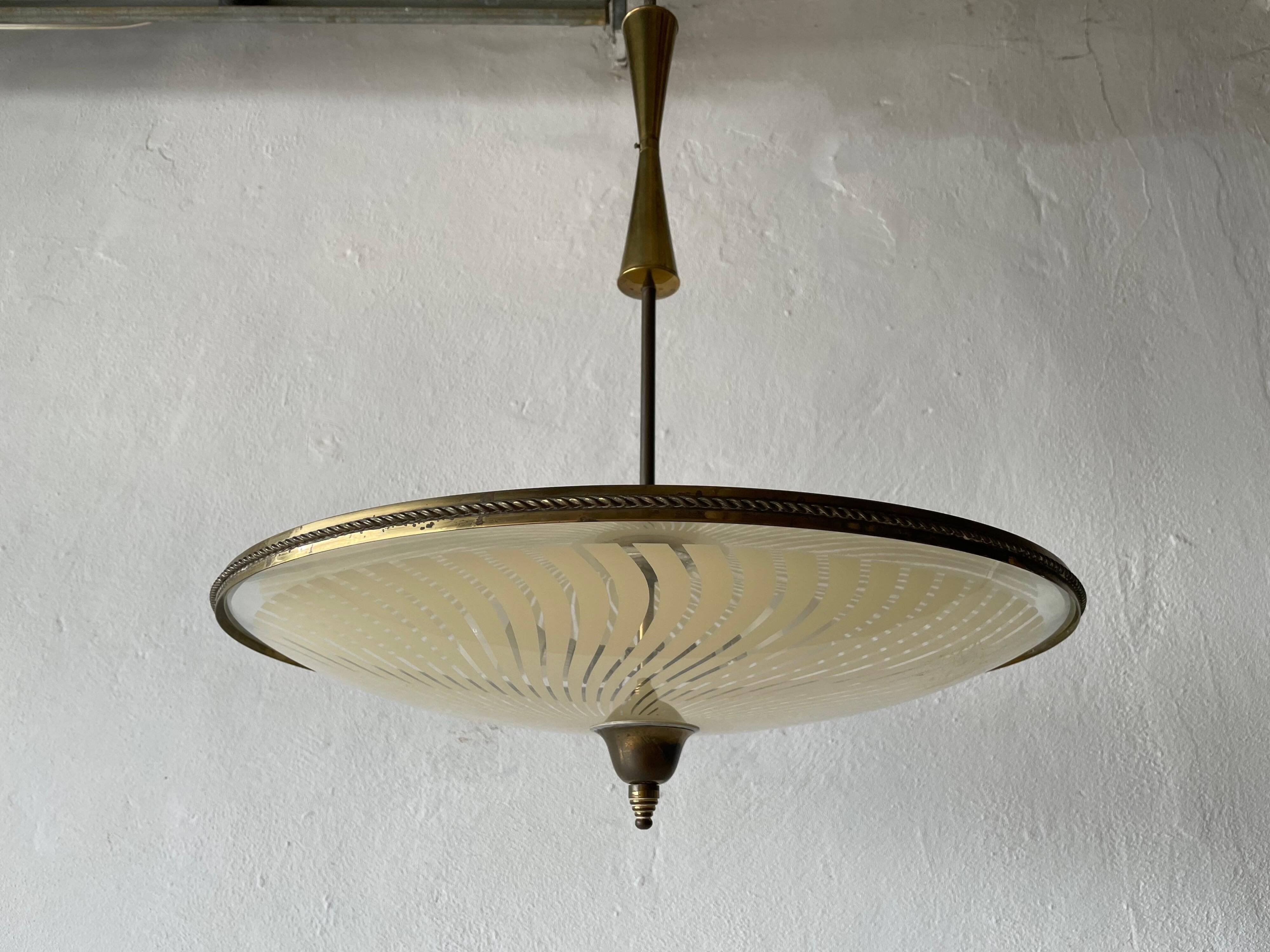 Large UFO design ceiling light in brass and printed glass, 1950s, Italy.