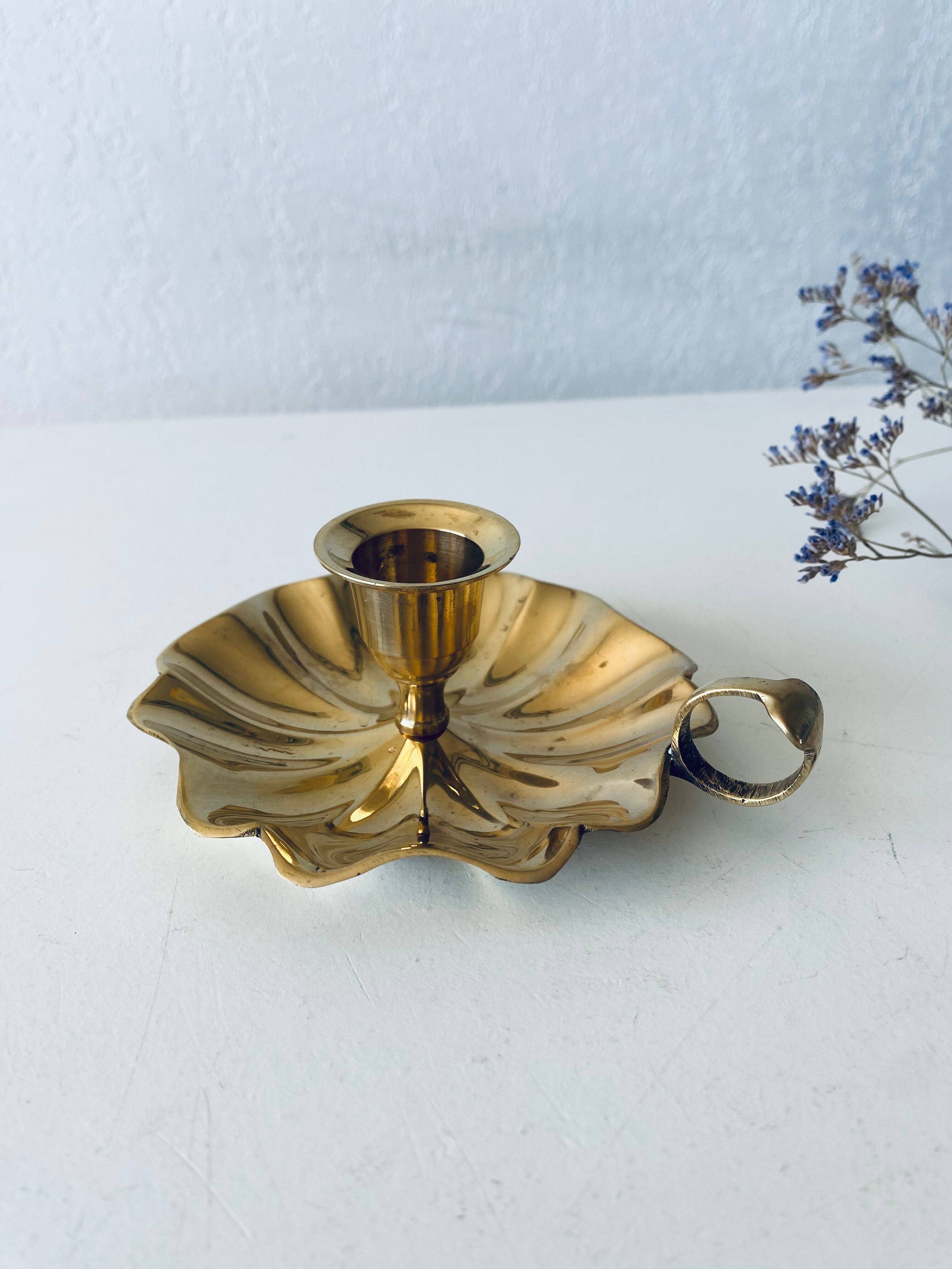 Indian candle holder in golden brass