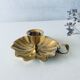 Indian candle holder in golden brass