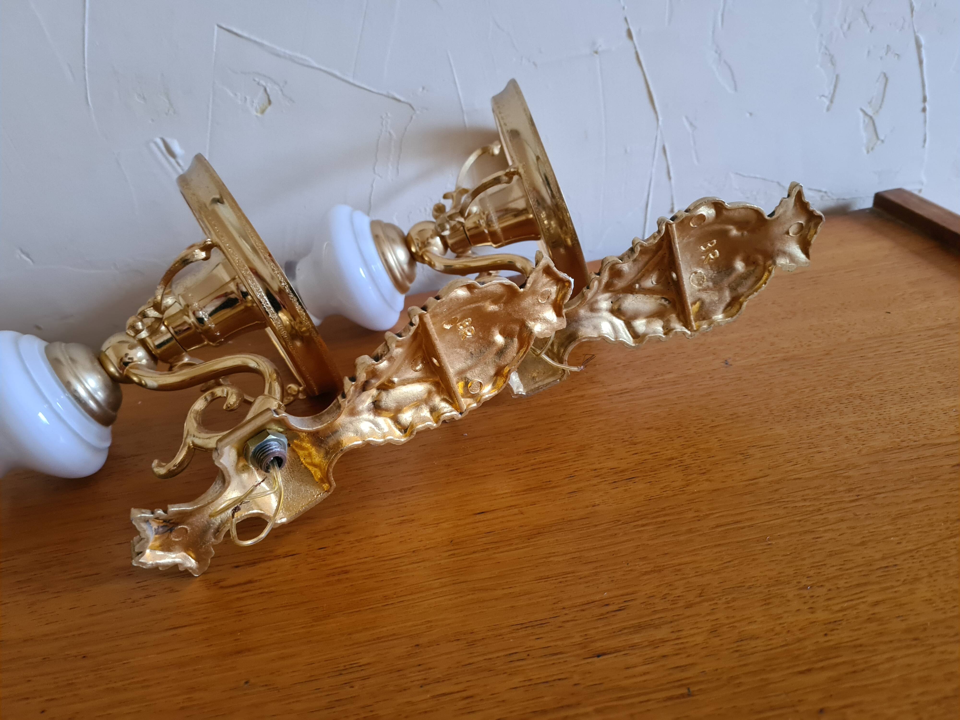 Pair of opaline and gilded brass wall lights