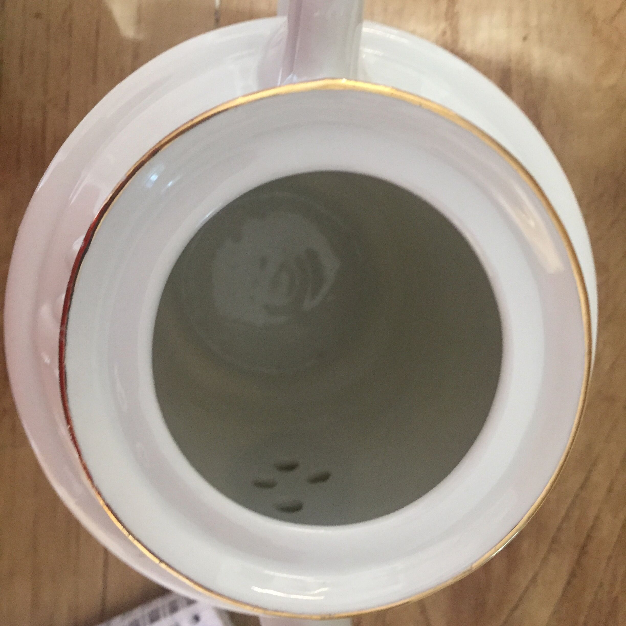 Old porcelain tea and coffee maker