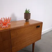 Vintage small teak cabinet with drawers, flap and black handles, hallway cabinet.