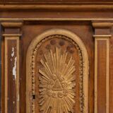 18th century tabernacle decorated with 2 columns and a sun on the facade