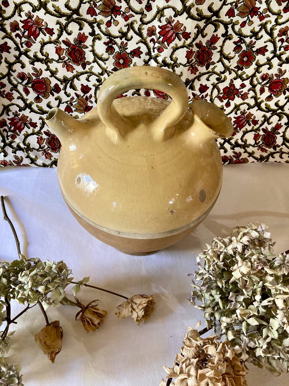 Yellow glazed terracotta gargoulette