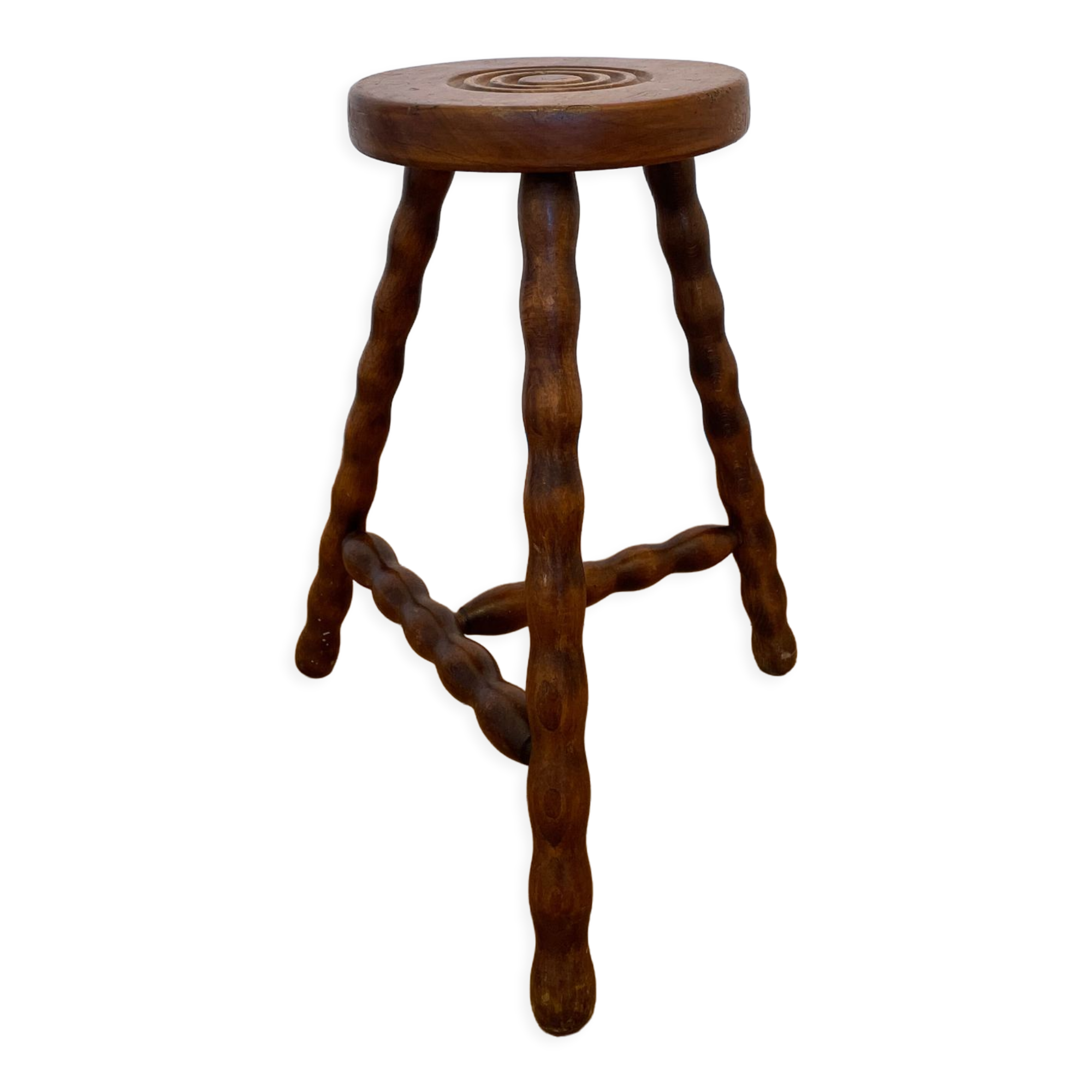 Old wooden tripod stool