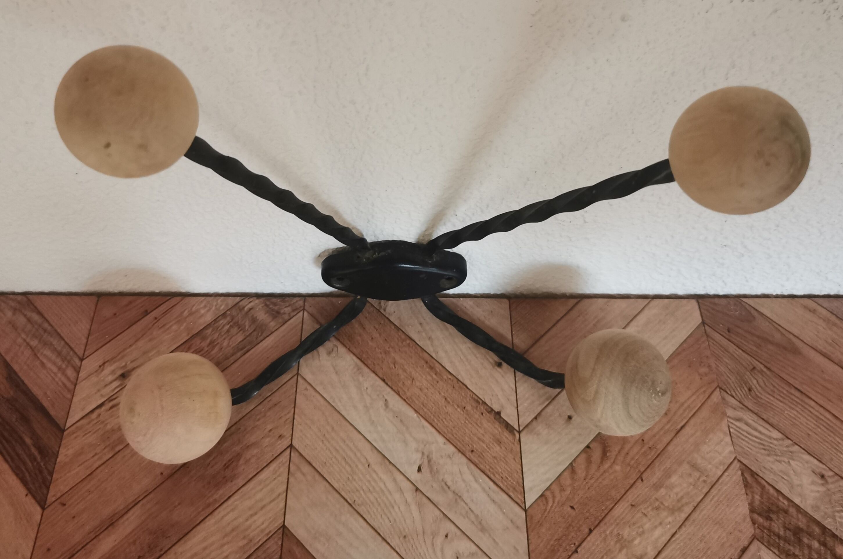 Wooden and iron wall coat holder