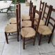 8 vintage straw chairs in the style of Charlotte Perriand.