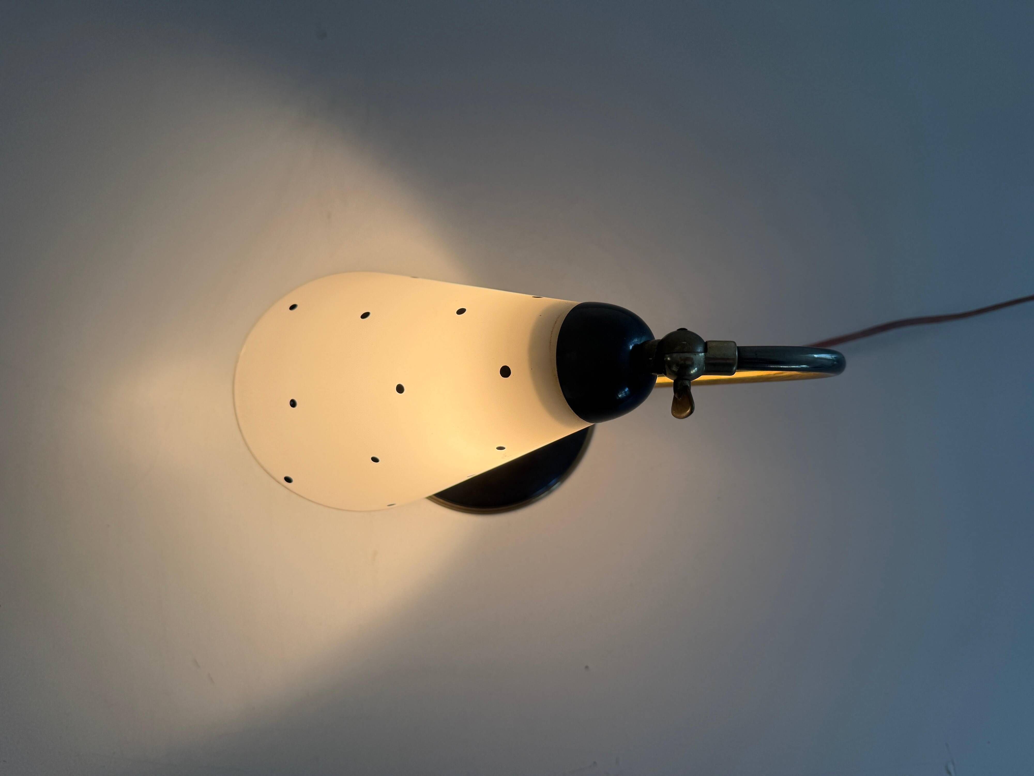 Mid-century bedside lamp in black metal and brass, 1950s, Germany