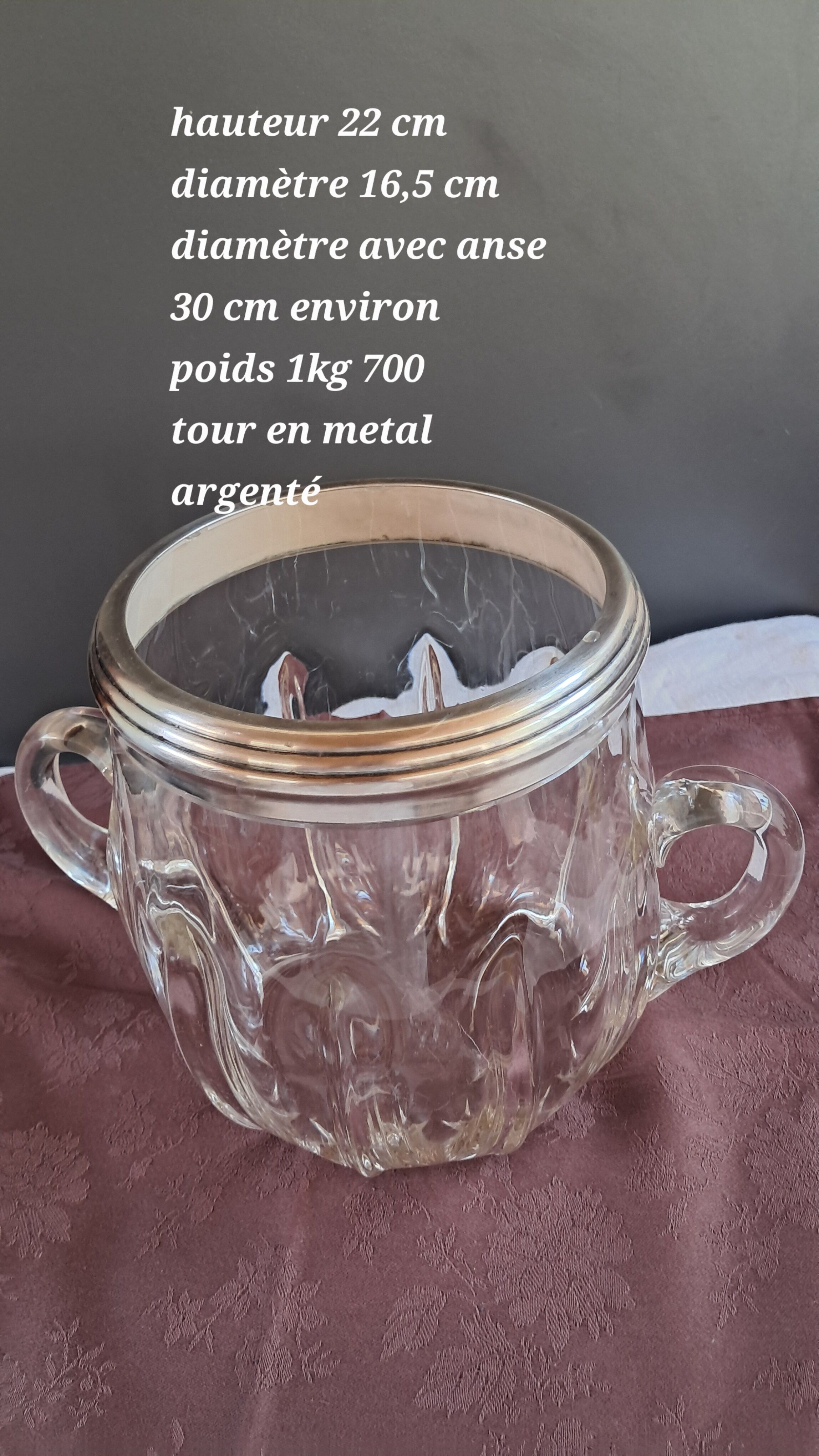 Twisted moulded glass bistro champagne bucket with a silver metal collar.
