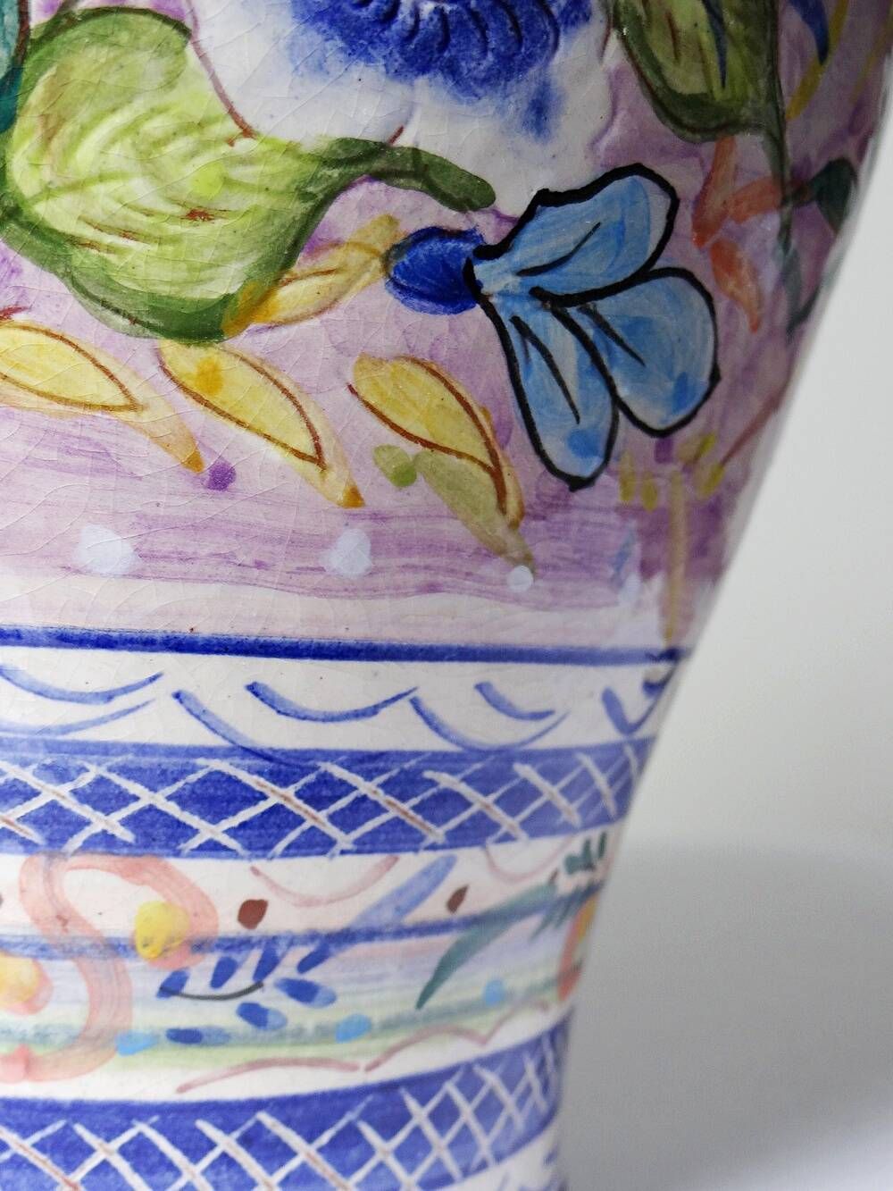 Vintage Portuguese vase in glazed terracotta with hand-painted floral decoration.