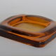 Empty amber glass pocket