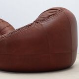 Pangolin leather sofa and armchair by Egg Designs