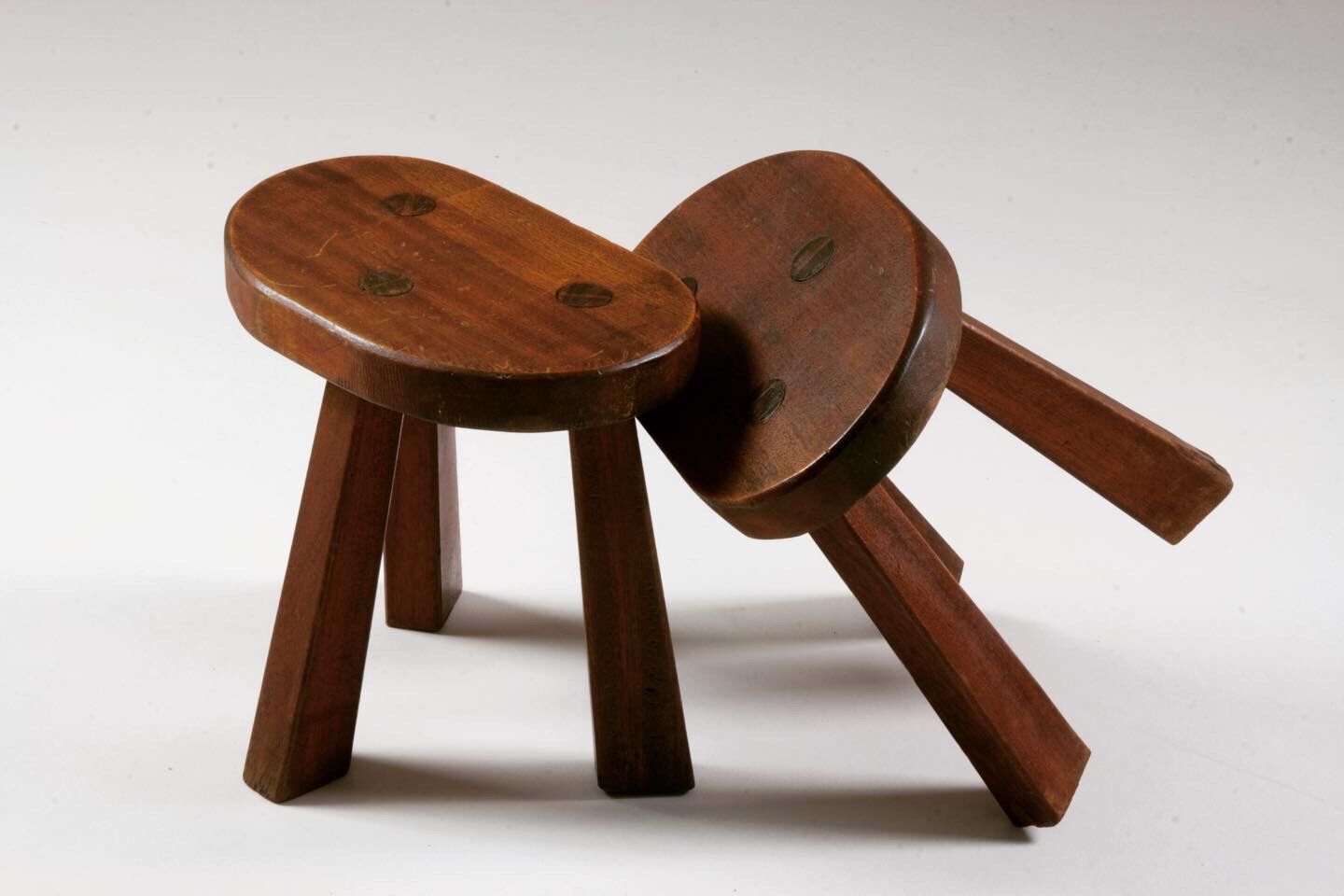 Pair of tripod brutalist stools, France 1950s