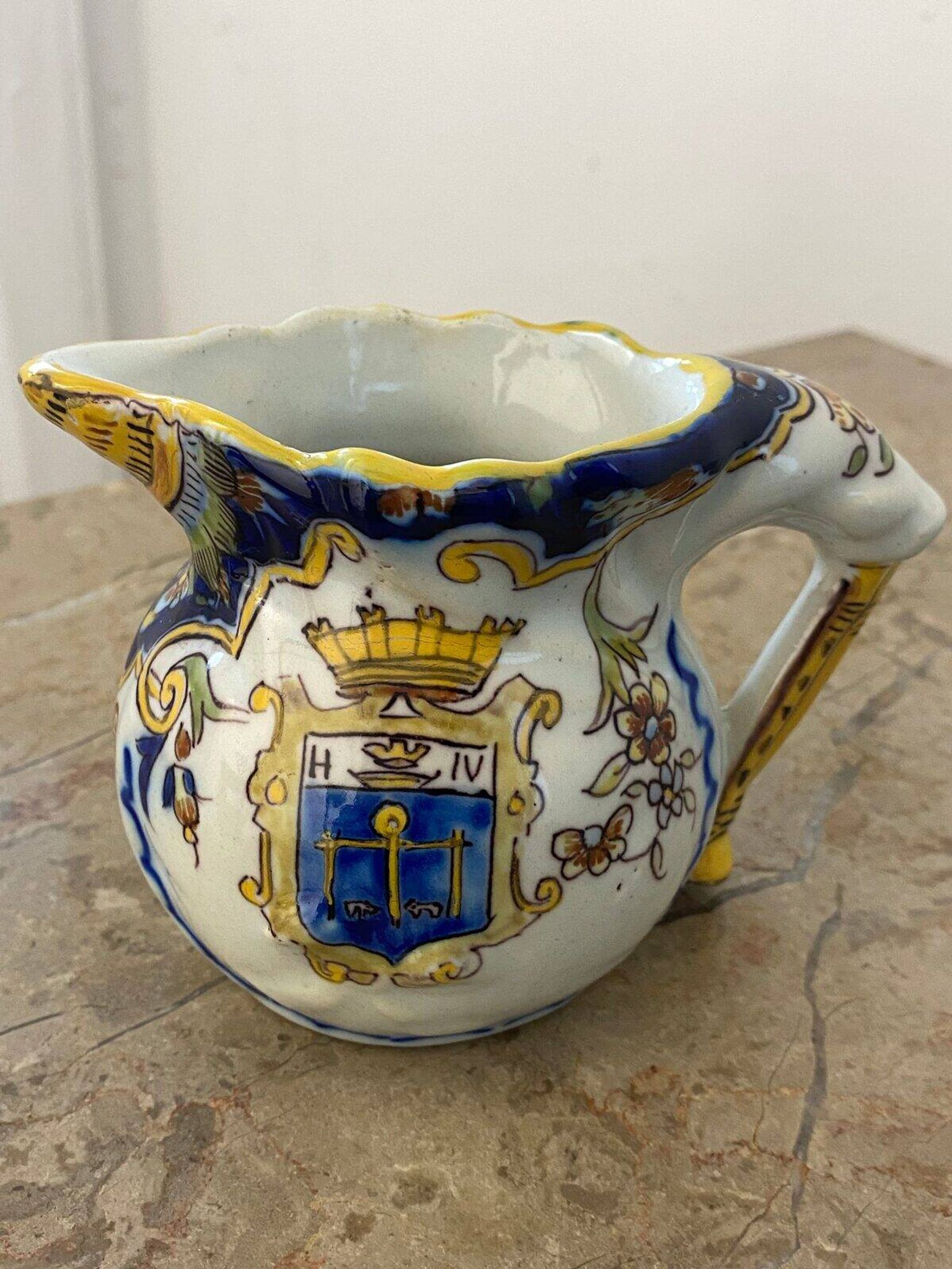 Small antique jug in faience from Les Sables d'Olonne, hand-painted.