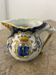 Small antique jug in faience from Les Sables d'Olonne, hand-painted.