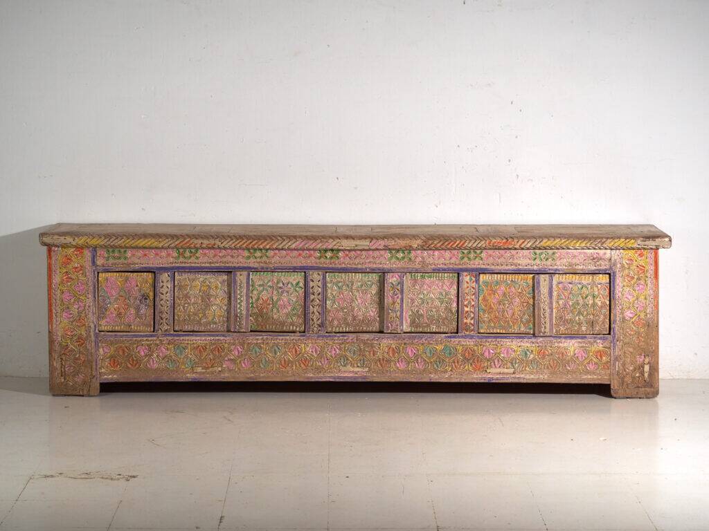 Antique polychrome carved low cabinet in pine – Xinjiang, circa 1900