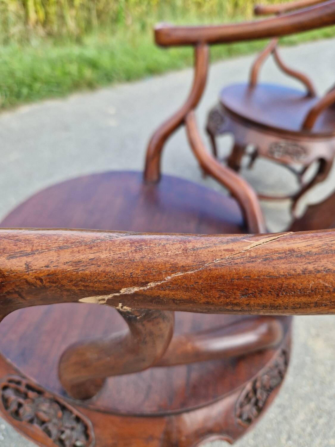 Pair of antique Chinese carved mahogany armchairs, circa 1960s