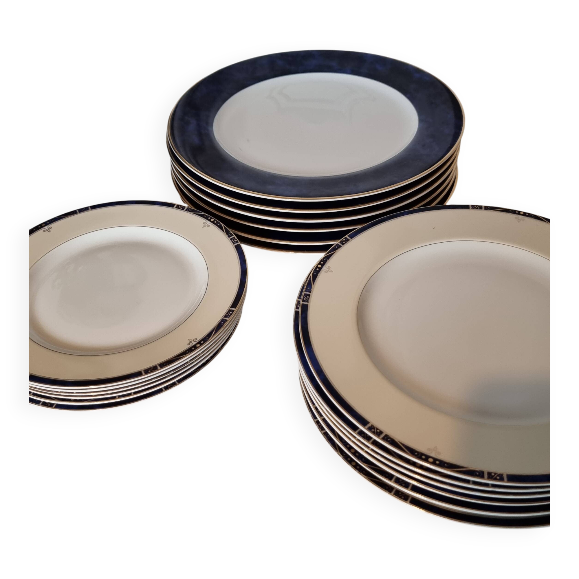 18-piece porcelain dinnerware set from Limoges by Philippe Deshoulières.