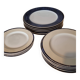 18-piece porcelain dinnerware set from Limoges by Philippe Deshoulières.