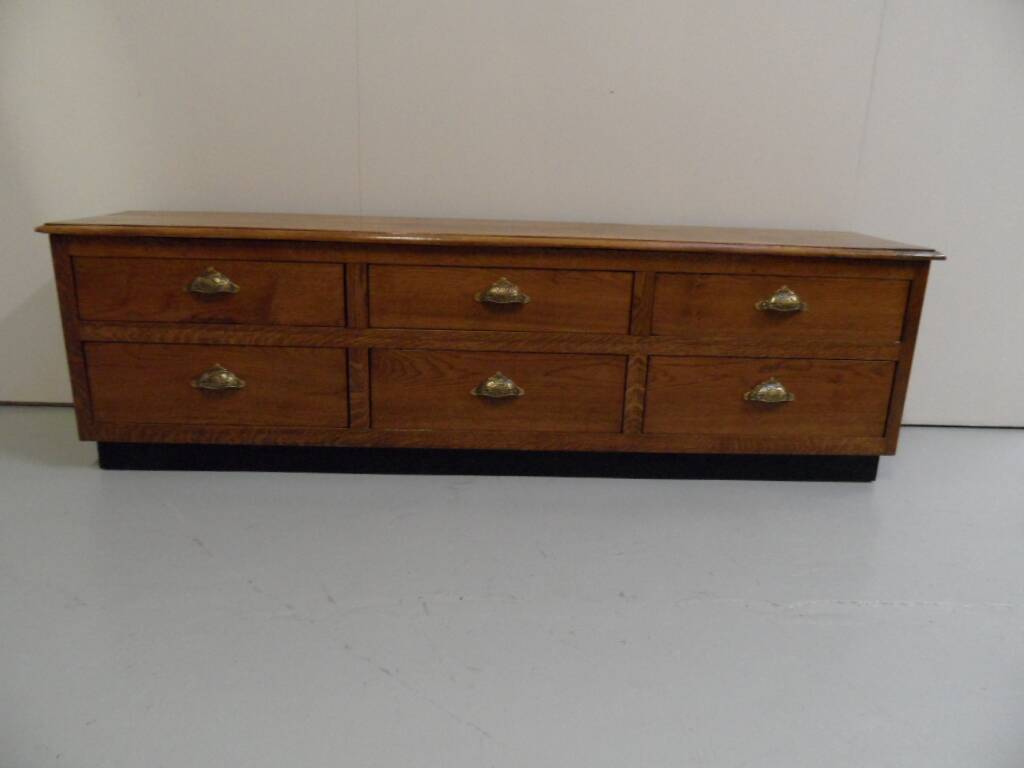 Vintage low TV cabinet from the 1950s with drawers.