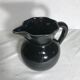 Former enamelled ceramic black pitcher 70s