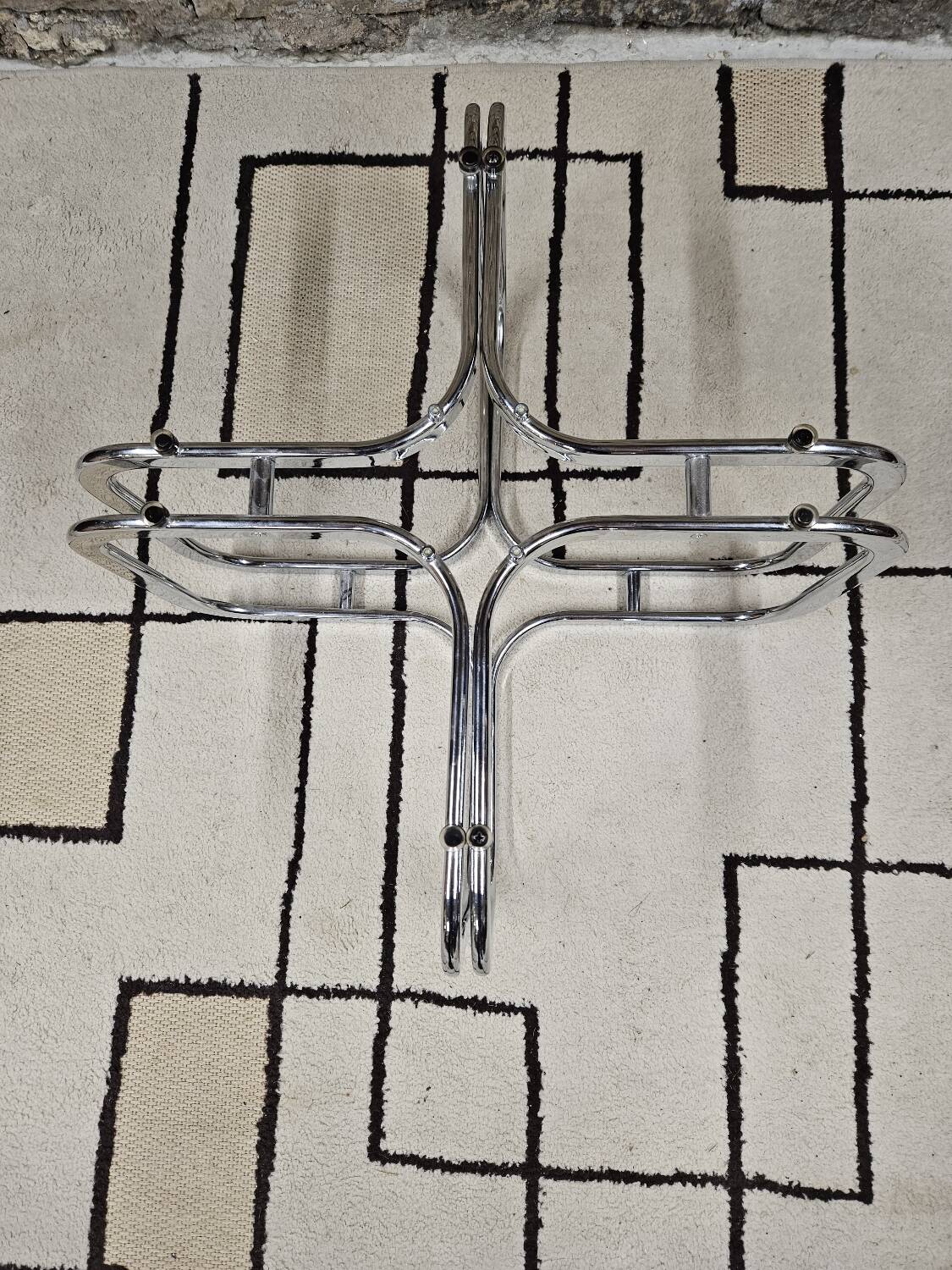 Round chrome coffee table with smoked glass