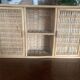 Rattan wall shelf