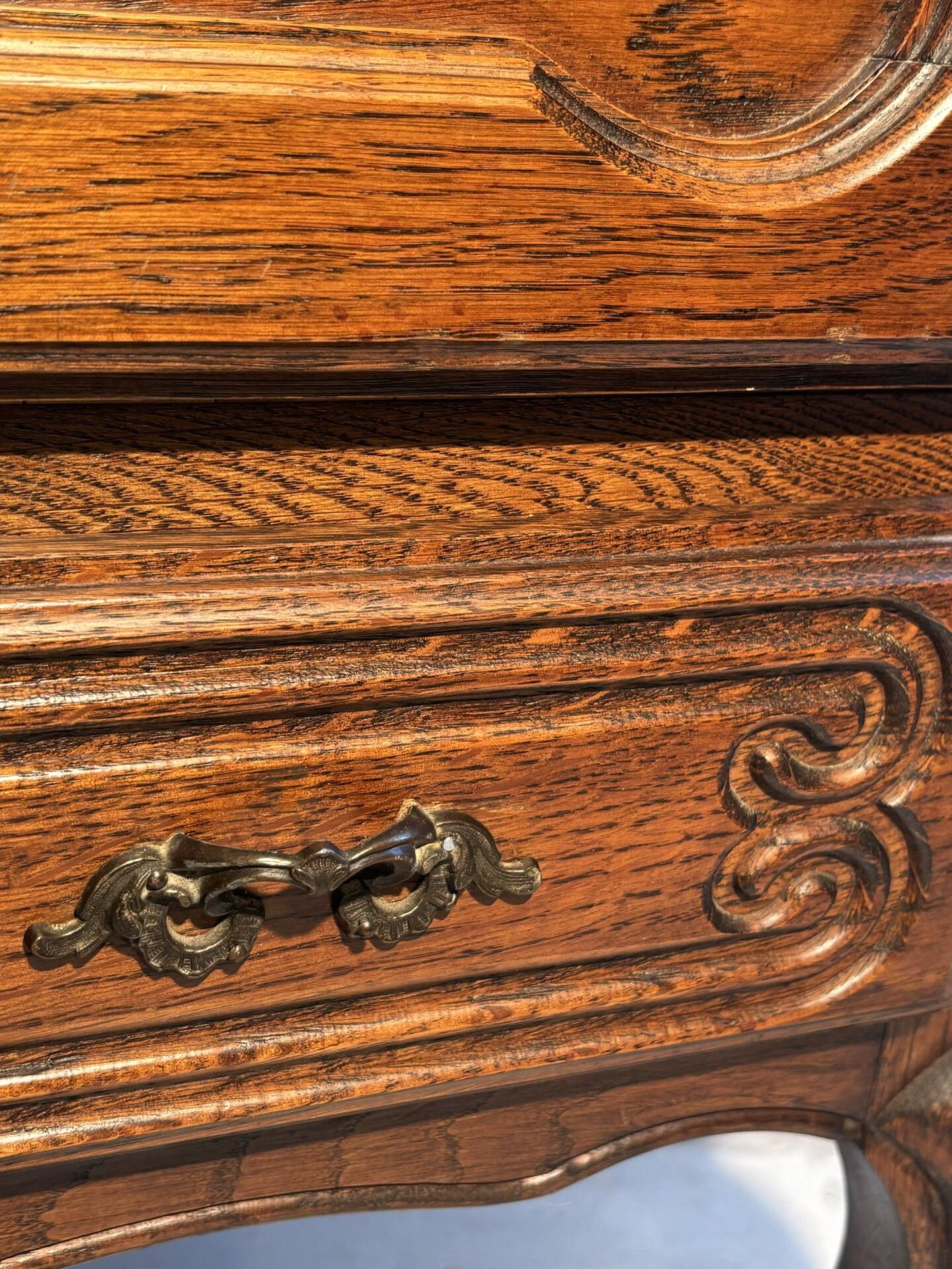 Louis XV style oak TV cabinet with drop-down flap.