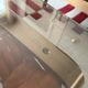 Table basse verre fumé pieds chromés