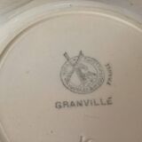 Four old earthenware plates