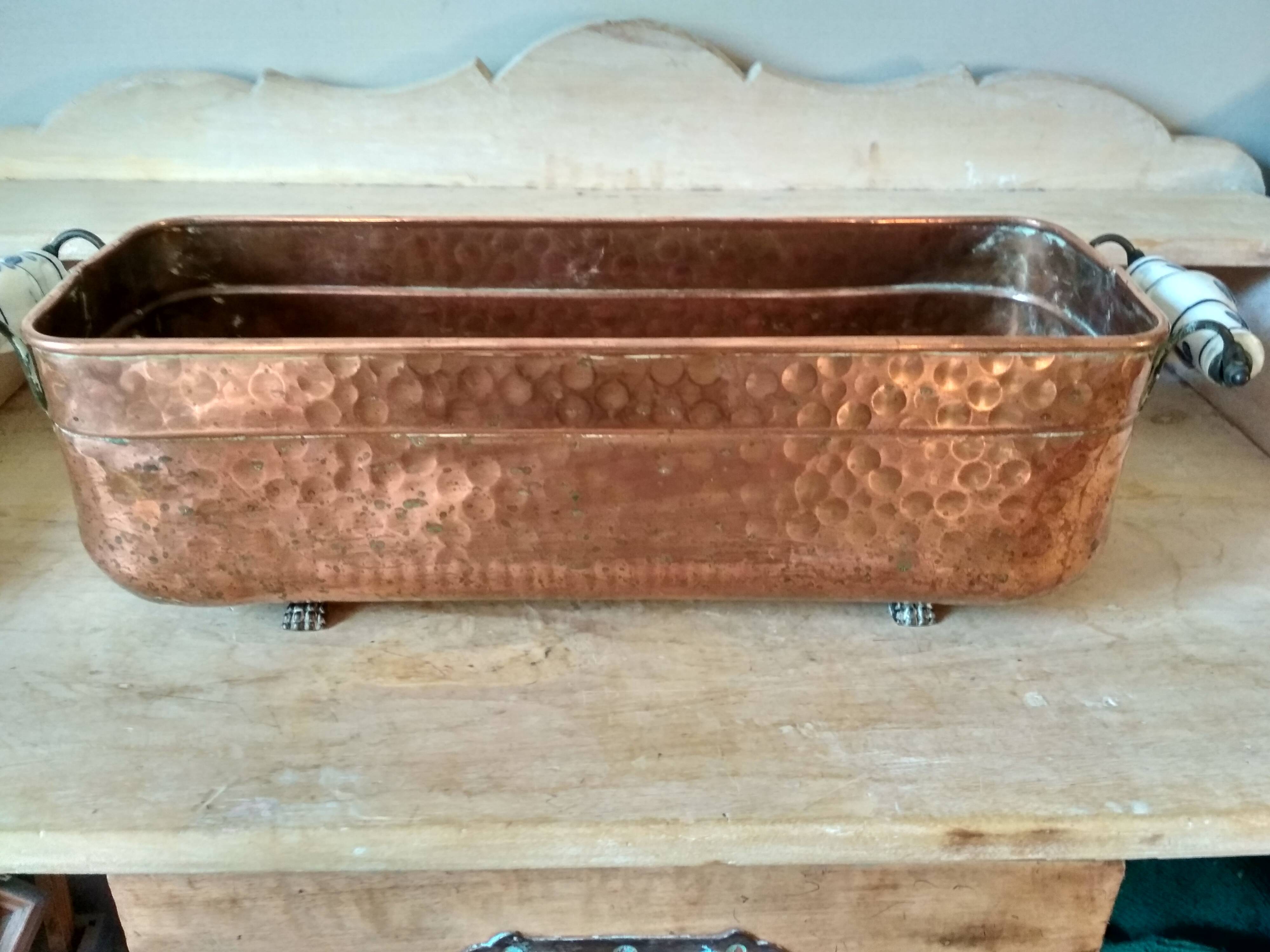 Large brass and copper planter, tray on 4 lion paw feet