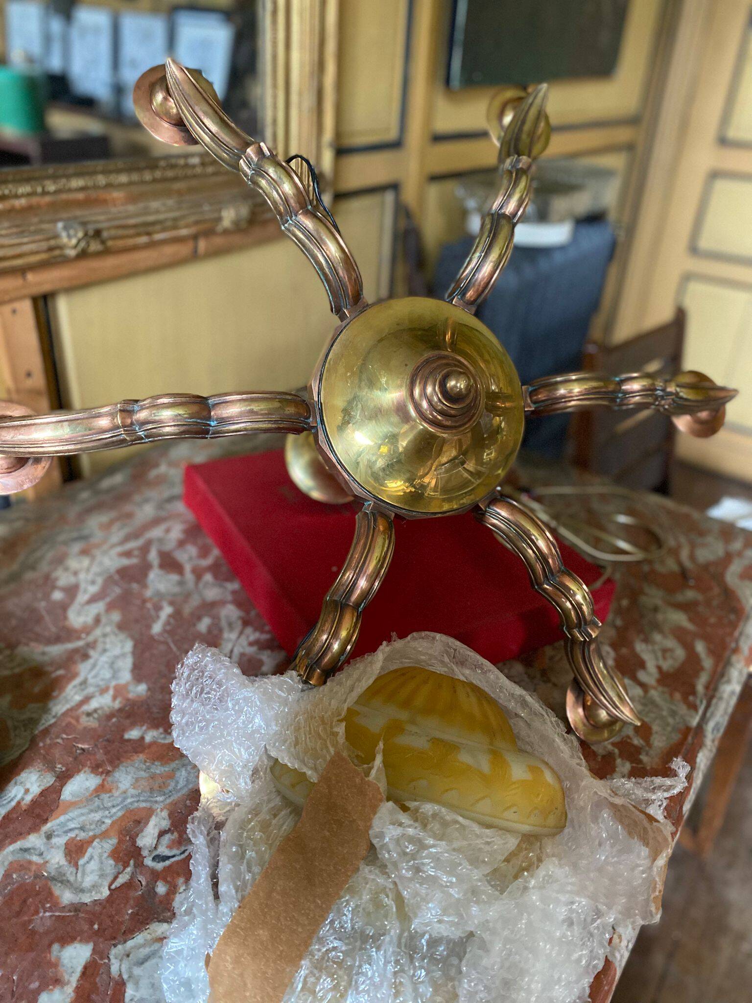 Art deco chandelier in copper with 6 glass tulips.