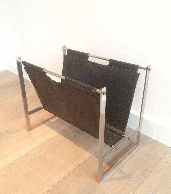 Magazine rack in brushed steel and leather, in the style of Poul Kjaerholm