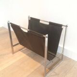 Magazine rack in brushed steel and leather, in the style of Poul Kjaerholm