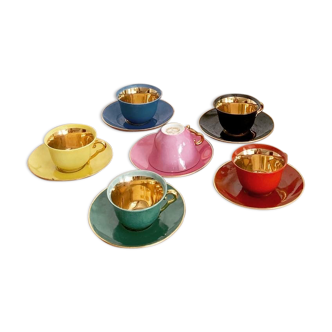Set of colorful porcelain cups and cups