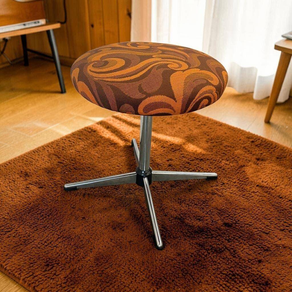 Vintage 70s pouf/stool with star base.