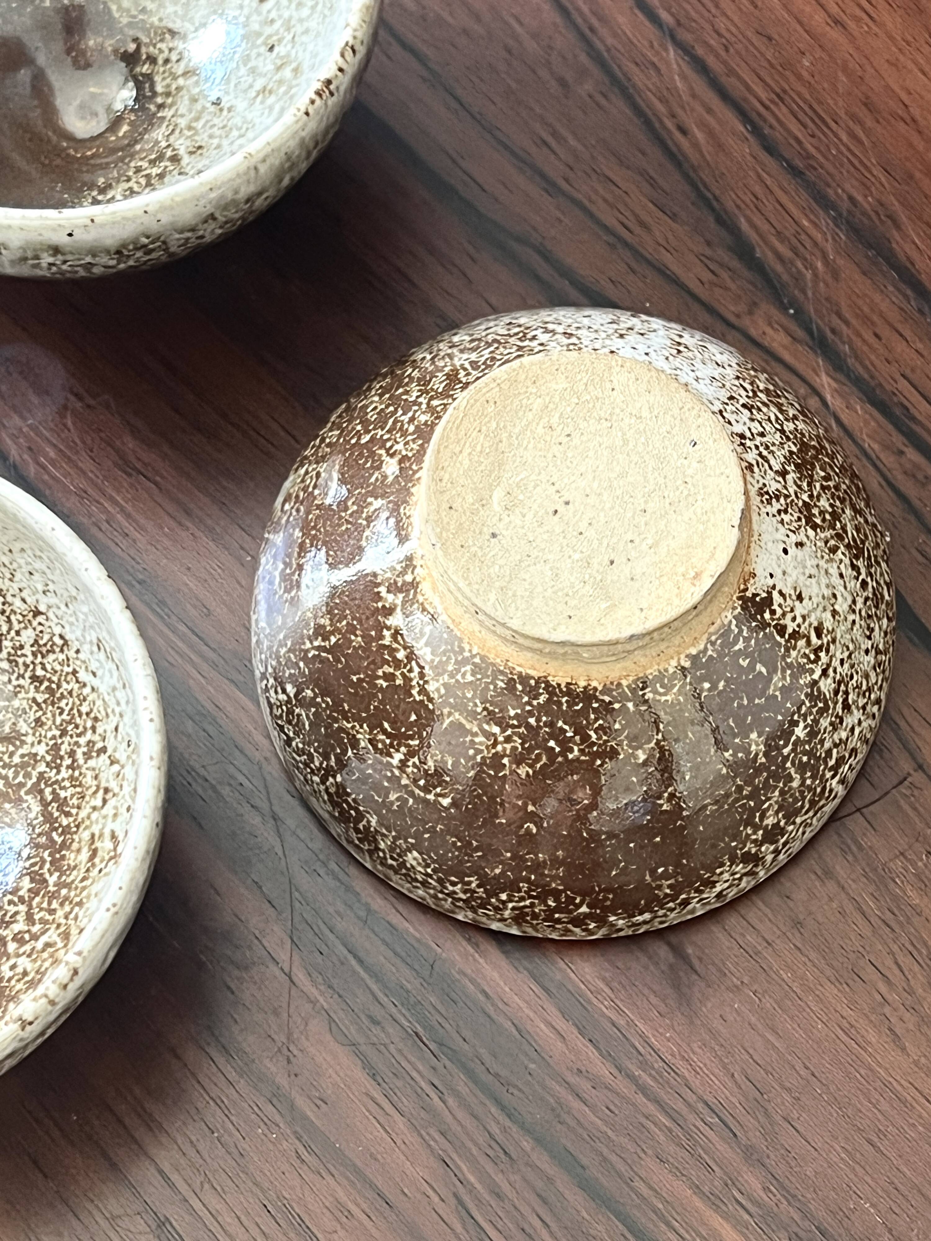 Set of 4 hand-turned glazed ceramic bowls