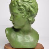 Bust of Eros in patinated plaster in imitation of bronze on wooden base
